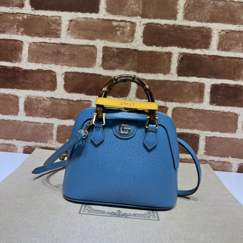 G*u*i top handle bags